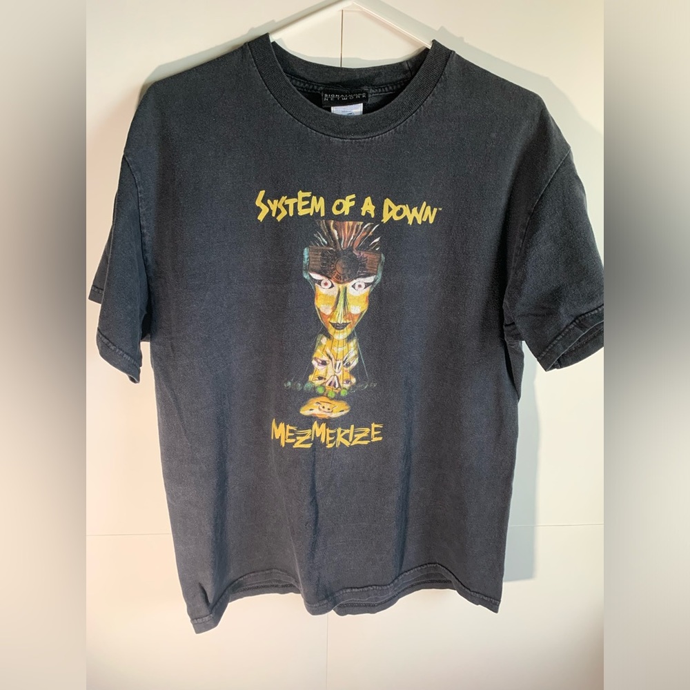 Y2K system of a down mesmerize graphic shirt